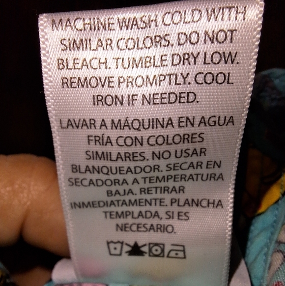 A set of ScrubStar scrubs in a medium. They feature a frog print all over. - Picture 2 of 5